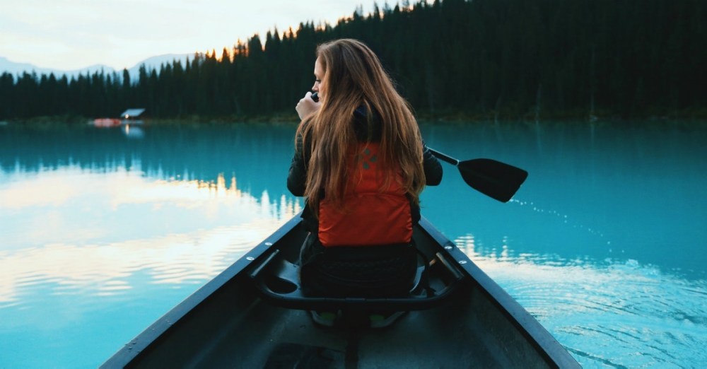 31154-womanincanoe-water-peace.1200w.tn